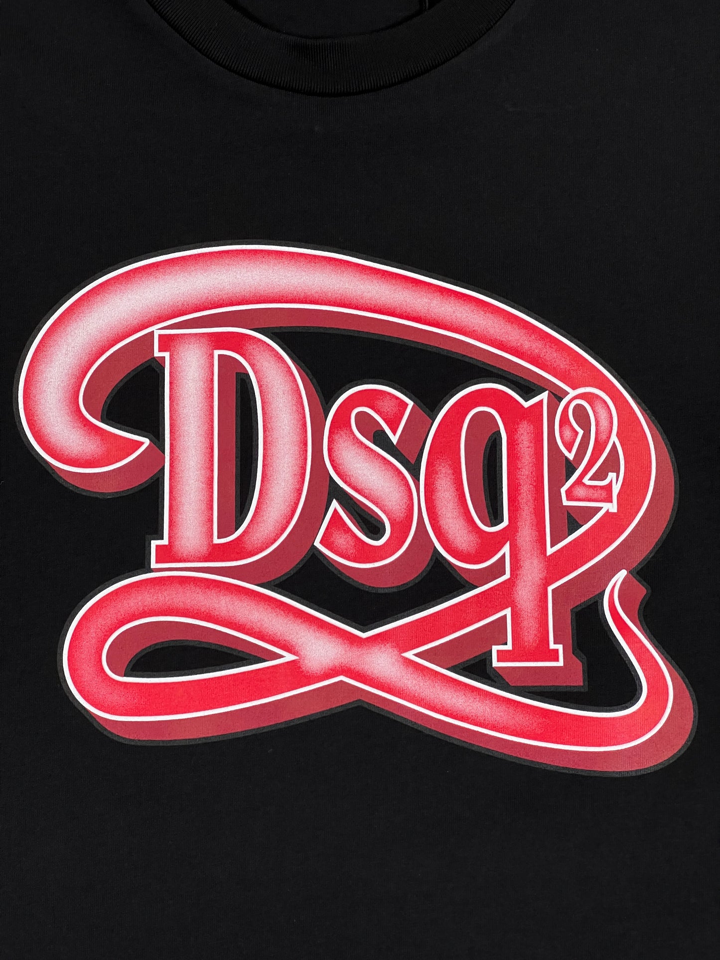 Red and white DSQUARED2 logo on a black background, made in Romania.