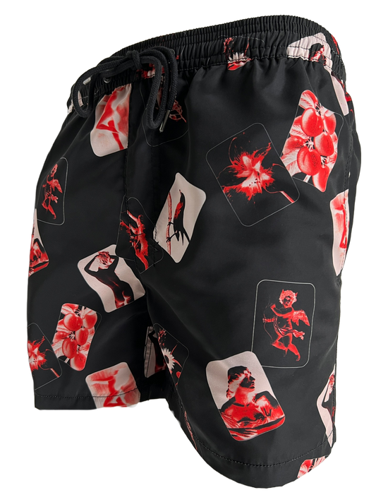 A KSUBI ICONS BOARDSHORT BLACK with a floral print.
