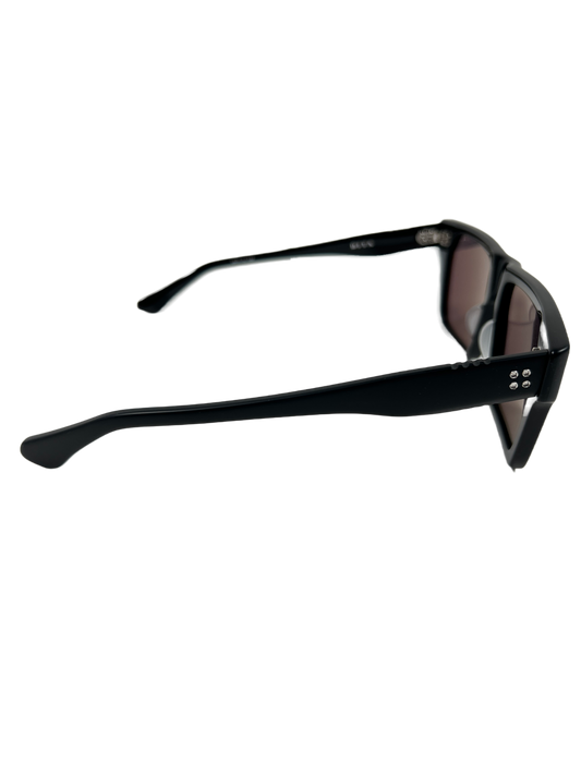 A pair of DITA VENZYN DTS720-A-03-56 sunglasses with UVA/UVB protection on a black background.