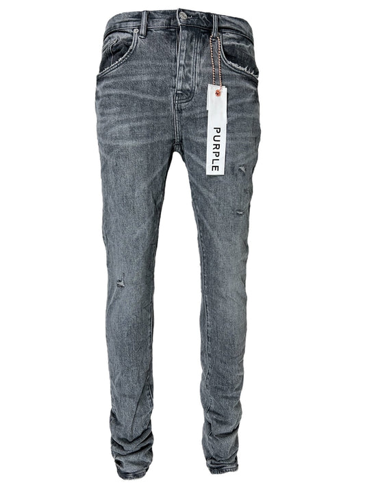 A pair of PURPLE BRAND P001-VAMG VINTAGE ABRASIONS GREY in stretch denim with a vintage look, featuring a tag labeled "PURPLE BRAND" hanging from a belt loop.