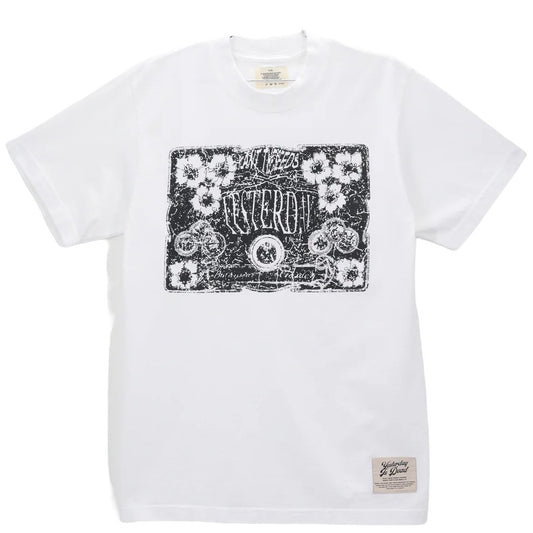 YESTERDAY IS DEAD white 100% cotton t-shirt with black graphic print featuring skulls, floral motifs, and the phrase "YESTERDAY IS DEAD.