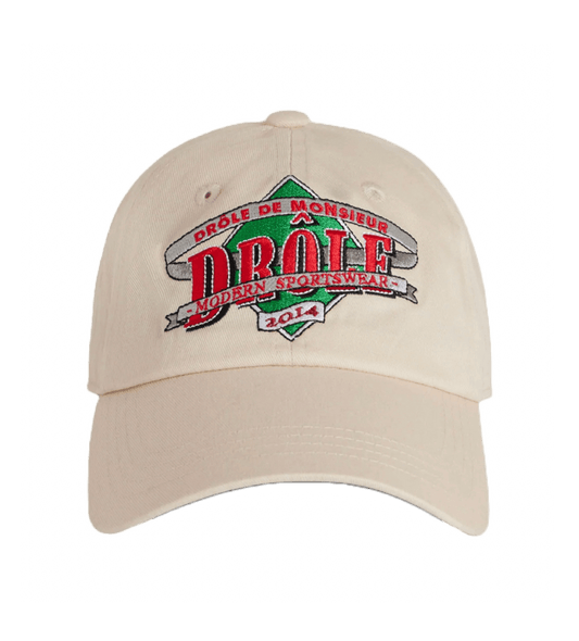 A DROLE DE MONSIEUR hat with the word "drool" embroidered on it.