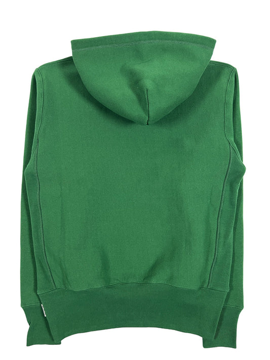 An ADVISORY BOARD CRYSTALS green cotton pullover hoodie on a white background.