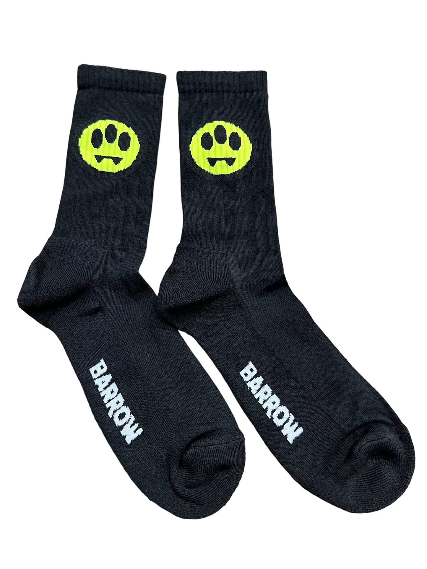 A pair of black BARROW S4BWUASO140 graphic socks with neon green smiley face logos on the ankles, Made In Italy.