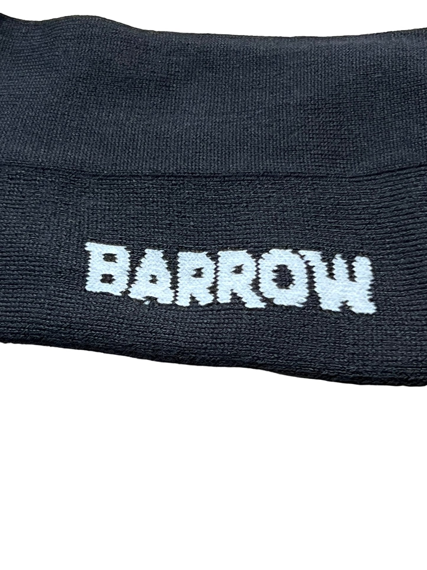 Close-up of a black fabric with the word "BARROW" embroidered in white thread on BARROW S4BWUASO140 SOCKS UNISEX.