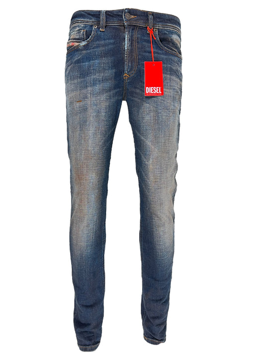 A pair of Diesel men's skinny style jeans with a tag on them.