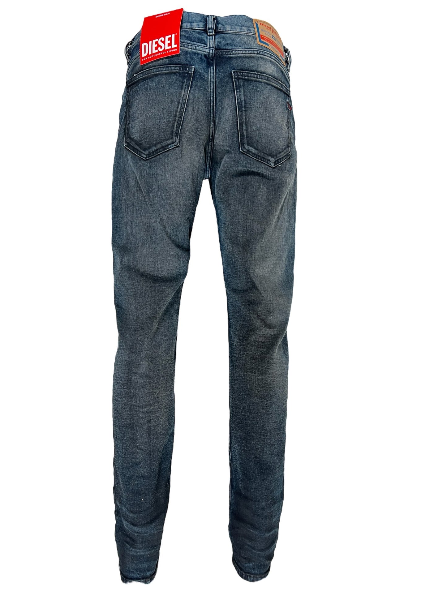 A pair of comfortable DIESEL jeans with a label on the back.