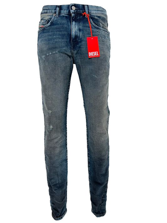 A pair of comfortable Diesel jeans with a tag on them.