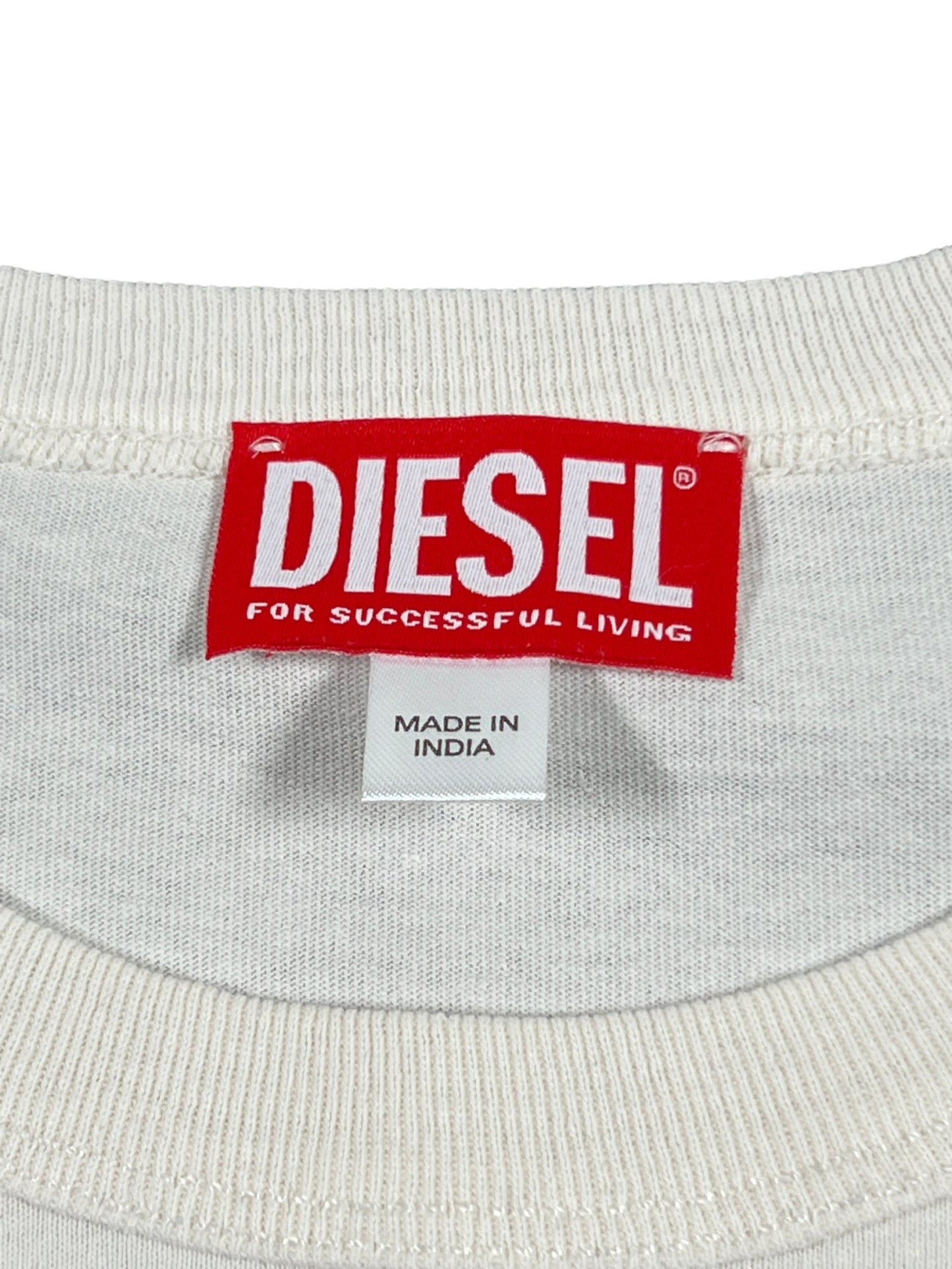 Red DIESEL logo on the waistband of a relaxed-fit DIESEL T-BOXT-N12 T-SHIRT WHITE with a 'made in India' label below.