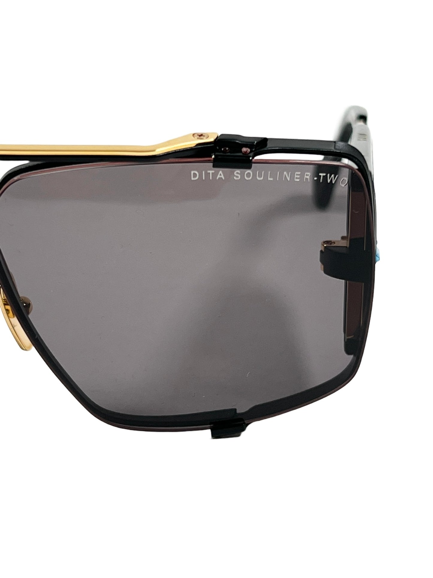 A pair of DITA SOULINER-TWO DTS136-64-03 sunglasses with a matte black frame and gold trim.