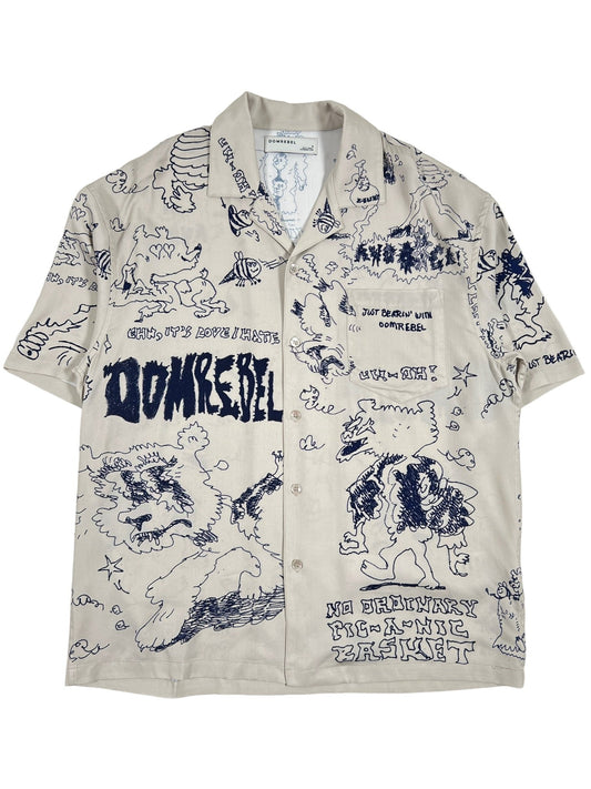 A DOMREBEL BEARING CAMP COLLAR SHIRT BEIGE with a print all over, featuring drawings in a Hawaiian style.