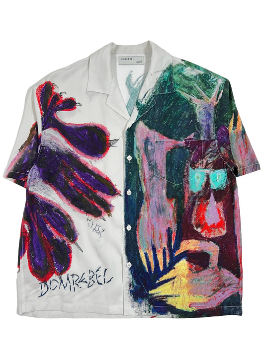 A white DOMREBEL CREATURE CAMP COLLAR SHIRT IVORY with an all-over print painting on it.