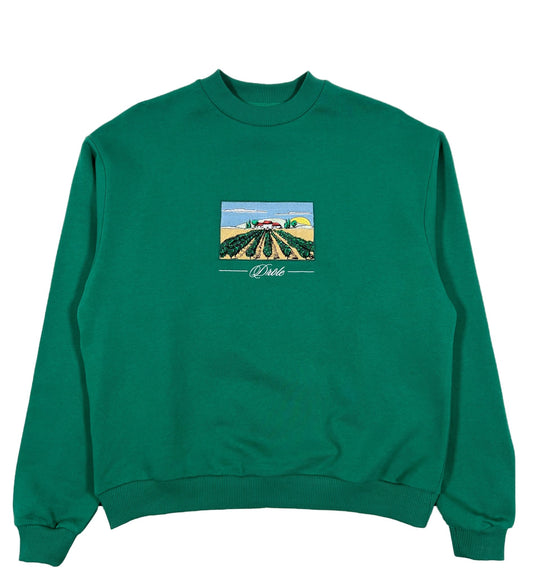 A DRÔLE DE MONSIEUR sweatshirt featuring landscape embroidery of a farm with a ribbed hem.