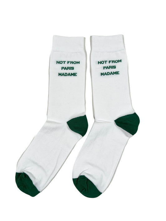 A pair of white and green cotton-blend DRÔLE DE MONSIEUR socks that say hot from the machine.