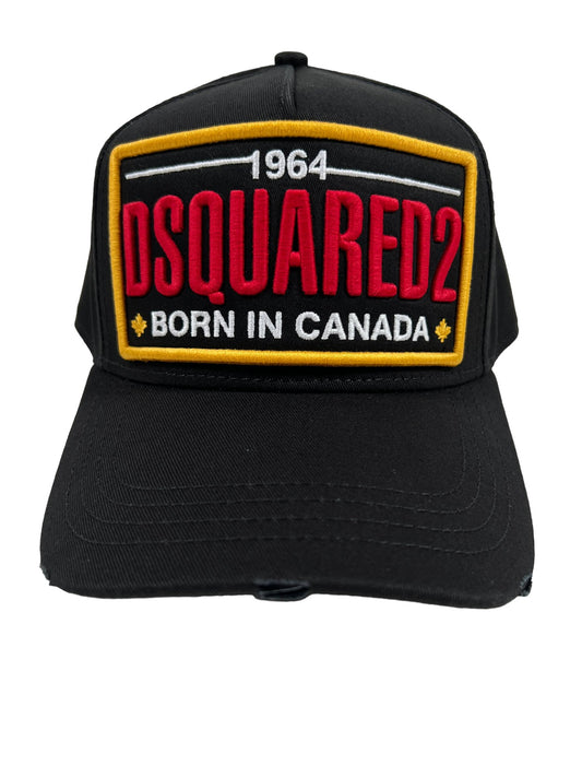A DSQUARED2 BCM0736 D2 LOGO BASEBALL CAP GABARDINE-NERO that says Dsquared2, born in Canada.