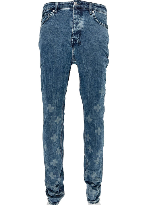 A pair of KSUBI CHITCH NIGHT SWIM DENIM jeans with stars on them.