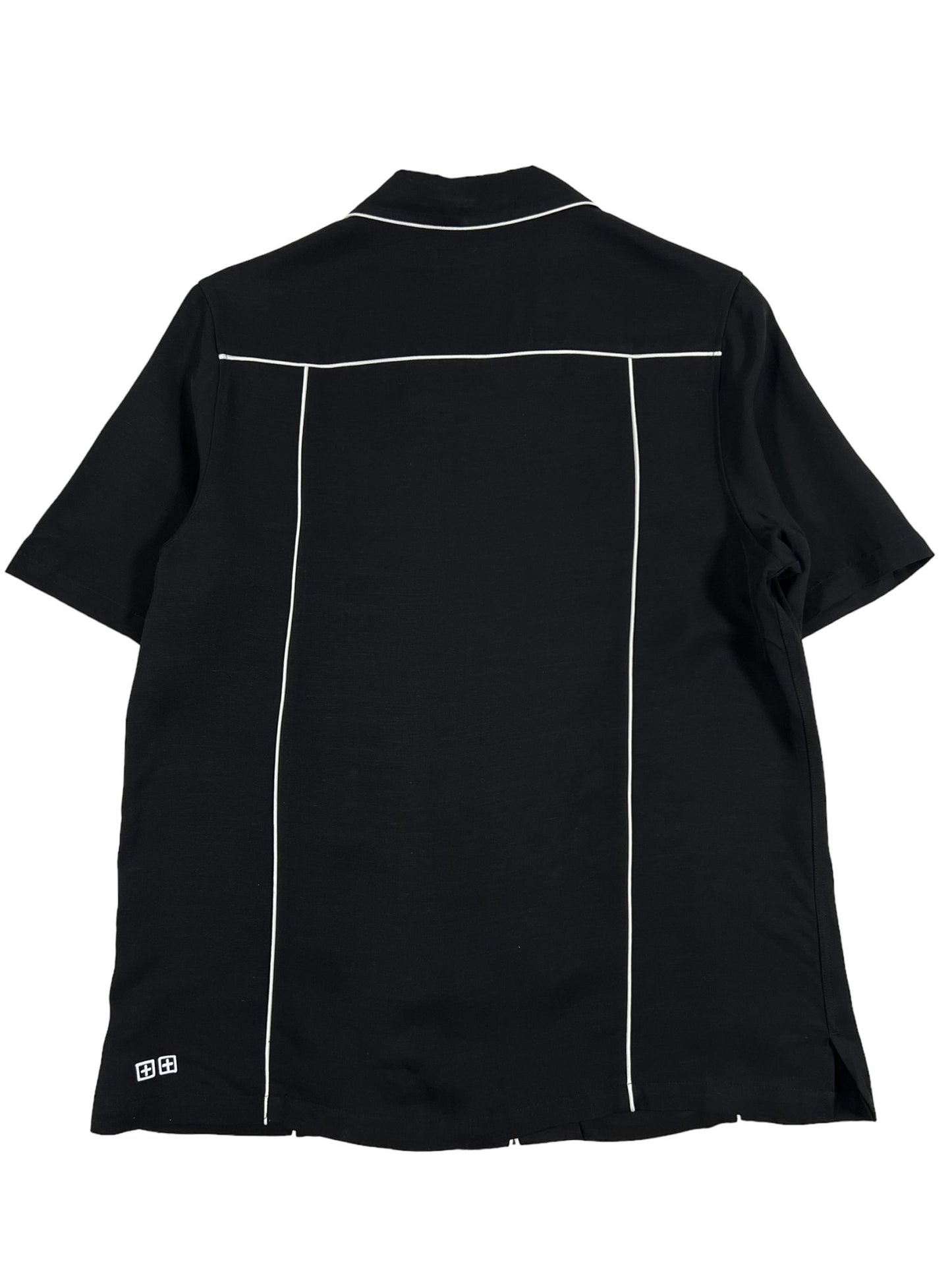 The back view of a KSUBI DOWNTOWN RESORT SS SHIRT BLACK with white pipping.