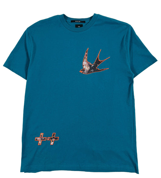 A KSUBI Ecology Biggie SS Tee in teal blue with an embroidered bird graphic on it.
