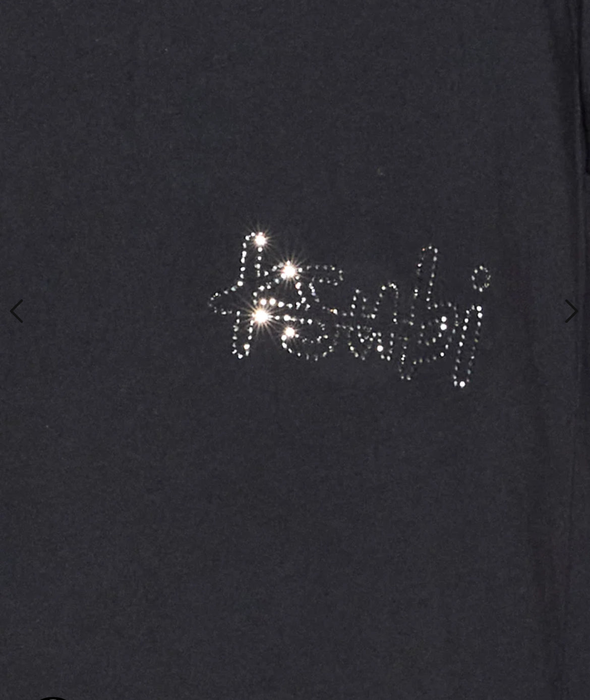A black tee with the word KSUBI in diamante crystal logo on it.