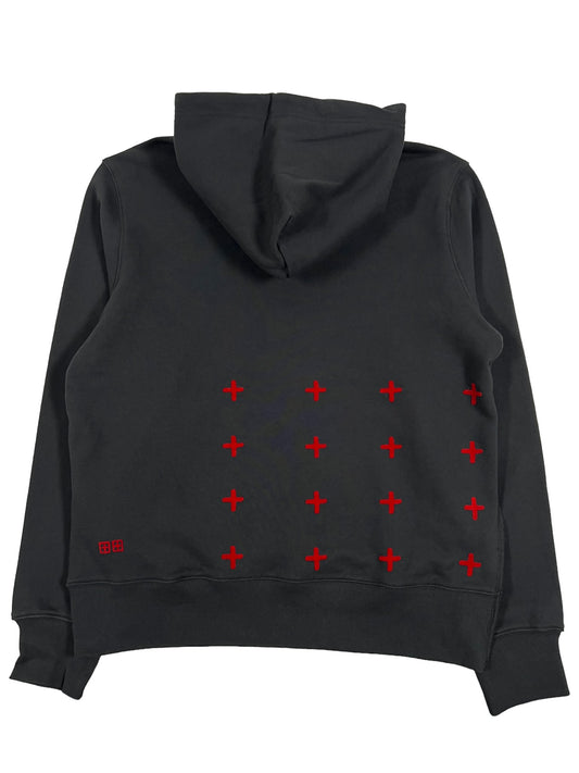 A KSUBI jet black hoodie with red crosses on it.