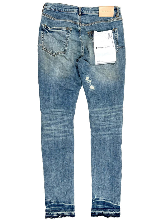 A pair of PURPLE BRAND JEANS P001-LIVI LIGHT INDIGO VINTAGE with a tag on the back.