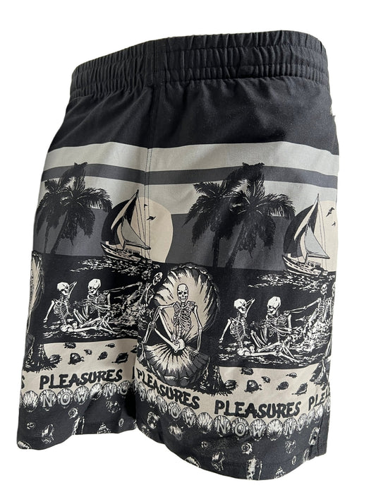 A PLEASURES black and white men's relaxed fit swim shorts with an image of a skeleton and palm trees.