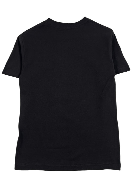 A PLEASURES black cotton t-shirt on a white background.