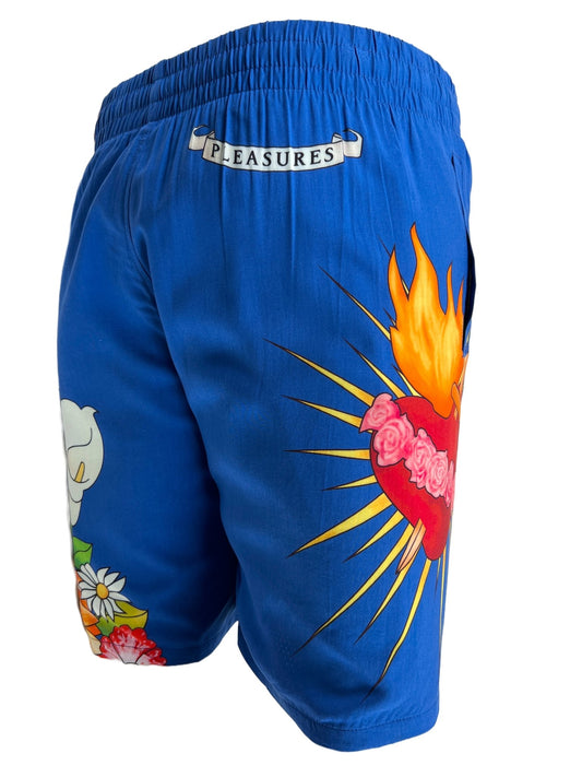 A PLEASURES heart swim short with flames on it.