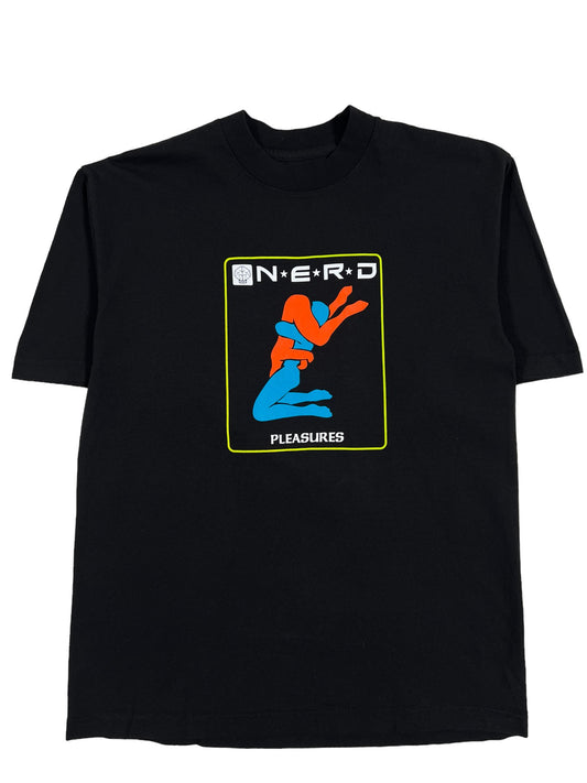 A black PLEASURES PROVIDER t-shirt with an image of Spider-Man, featuring a N.E.R.D. collaboration.