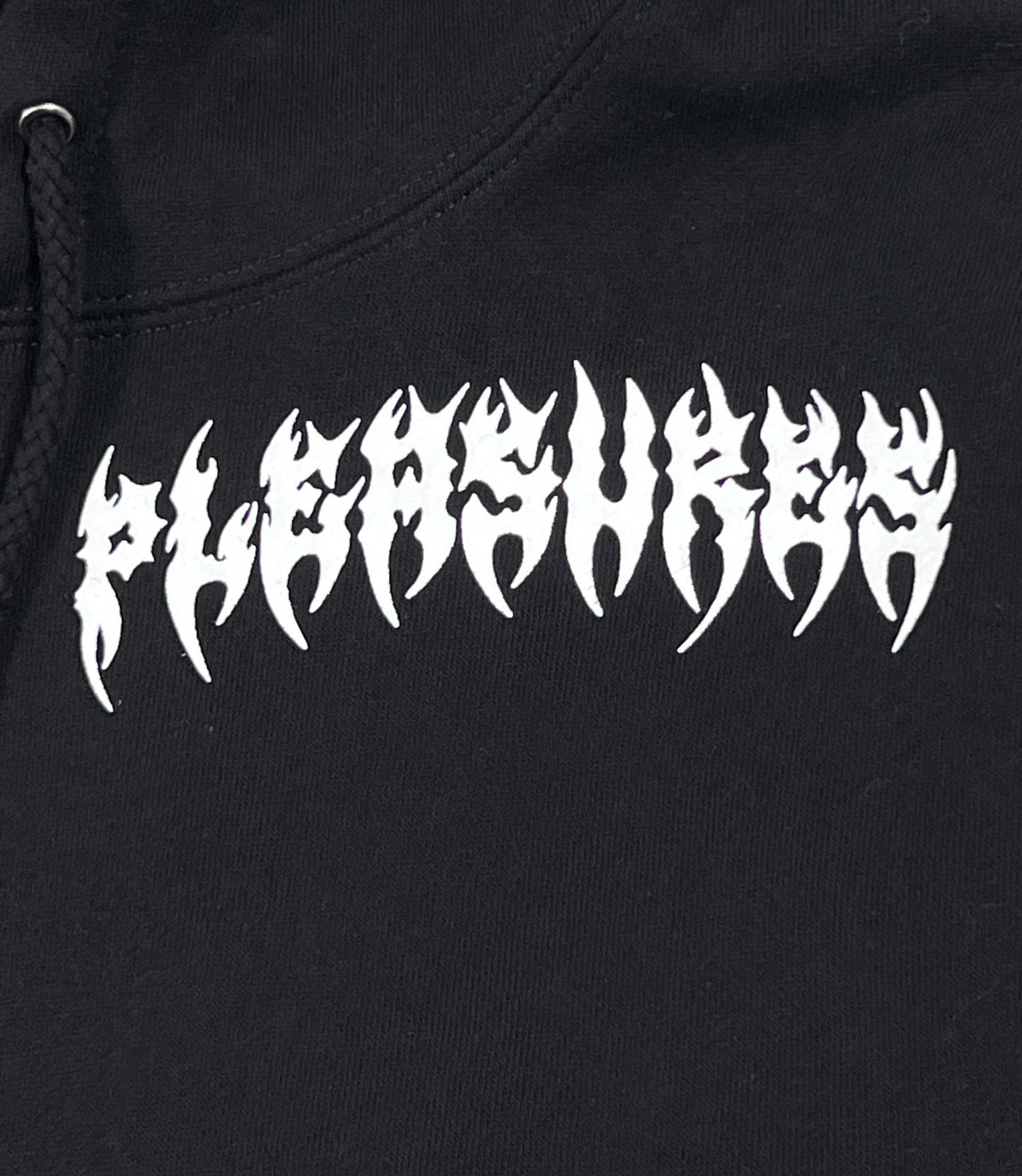 A black PLEASURES RIPPED HOODIE BLACK designed for comfort and warmth.