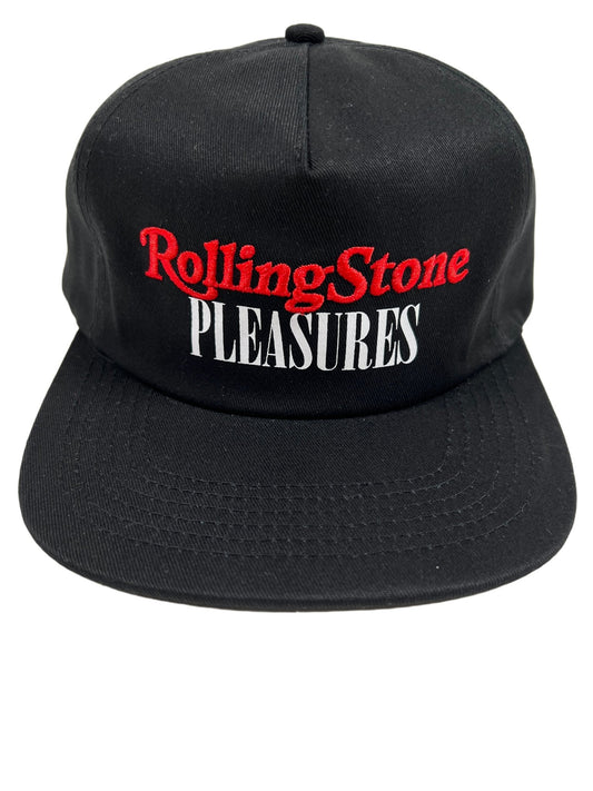 Embroidered PLEASURES ROLLING STONE snapback hat.