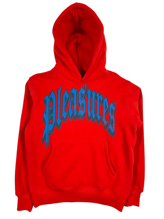 A red cotton hoodie with the word PLEASURES on it and a kangaroo pocket.