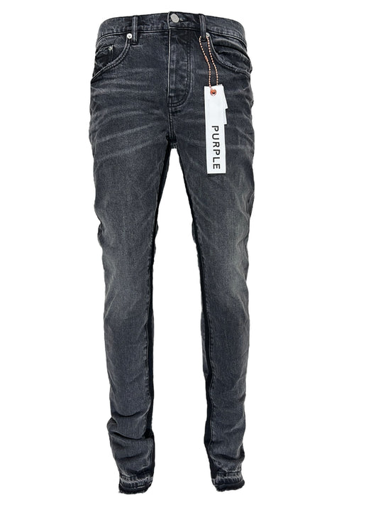A pair of PURPLE BRAND men's low rise skinny jeans with a tag on them.