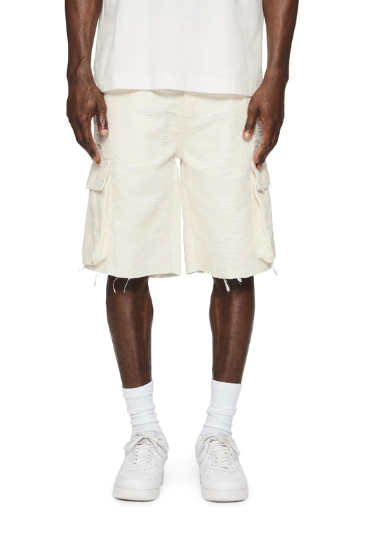 The man is wearing a white t-shirt and PURPLE BRAND P022-JCSW JACQUARD CARGO SHORTS IVORY.