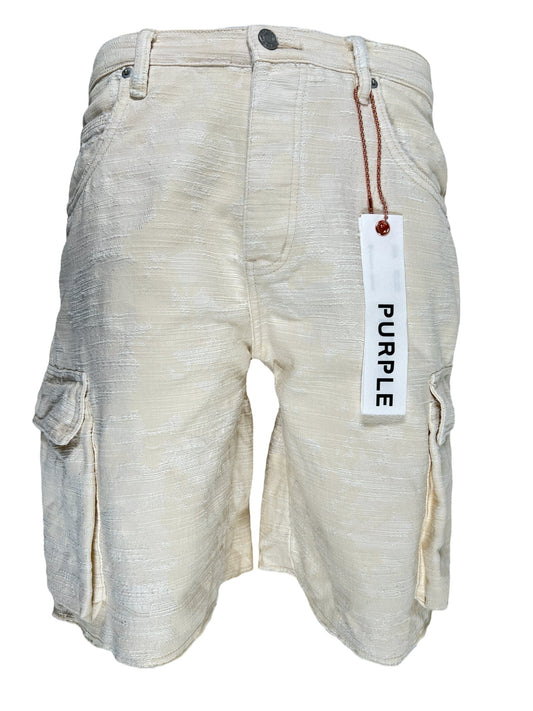 A pair of PURPLE BRAND P022-JCSW JACQUARD CARGO SHORTS IVORY with pockets and a tag on them.