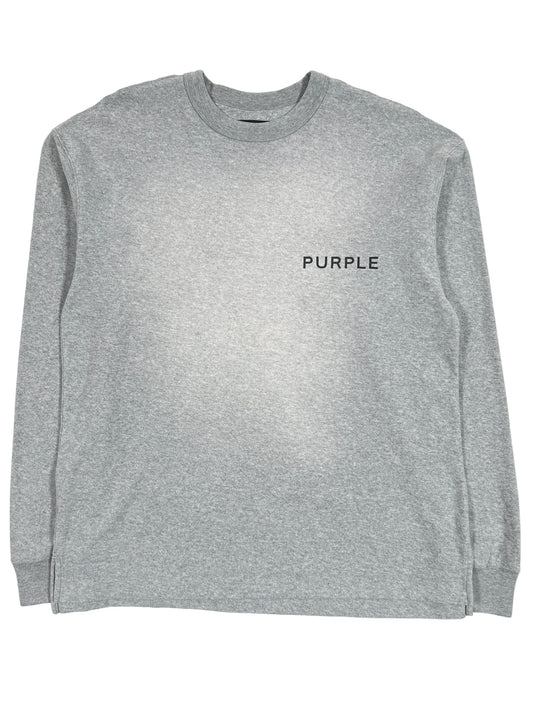 A grey long sleeve t-shirt from the Purple brand with the word "purple" on it, perfect for casual occasions. Replace with: A PURPLE BRAND P204-JHGW TEXTURED JERSEY LS TEE HEATHER, perfect for casual occasions.