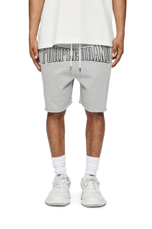 A man wearing a grey sweatshirt and relaxed fit shorts with the PURPLE BRAND P446-MFHG MWT FLEECE SWEATSHORT HEATHER on them, featuring an elastic waistband.