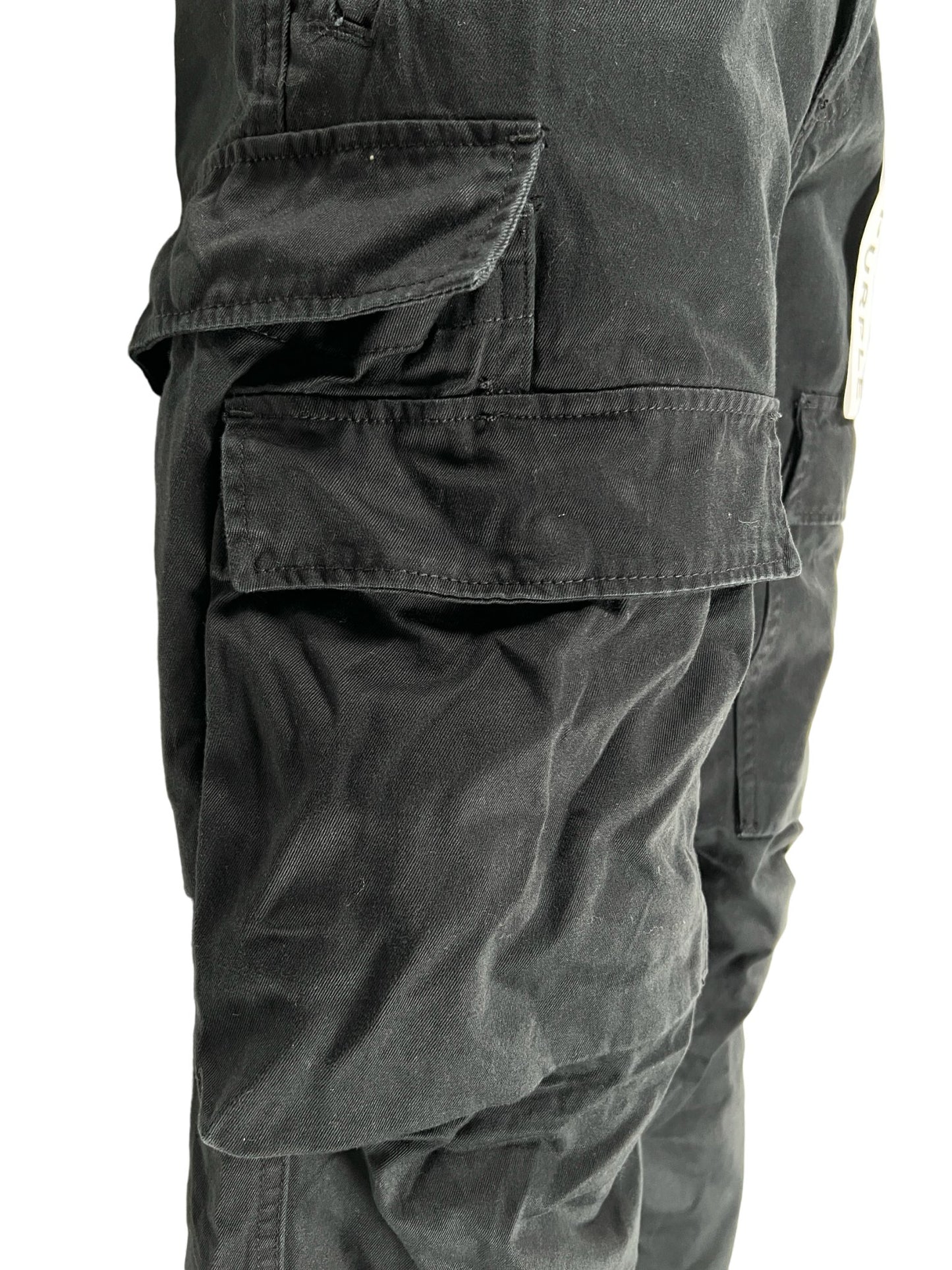 A pair of PURPLE BRAND cargo pants with multiple pockets on a white background.