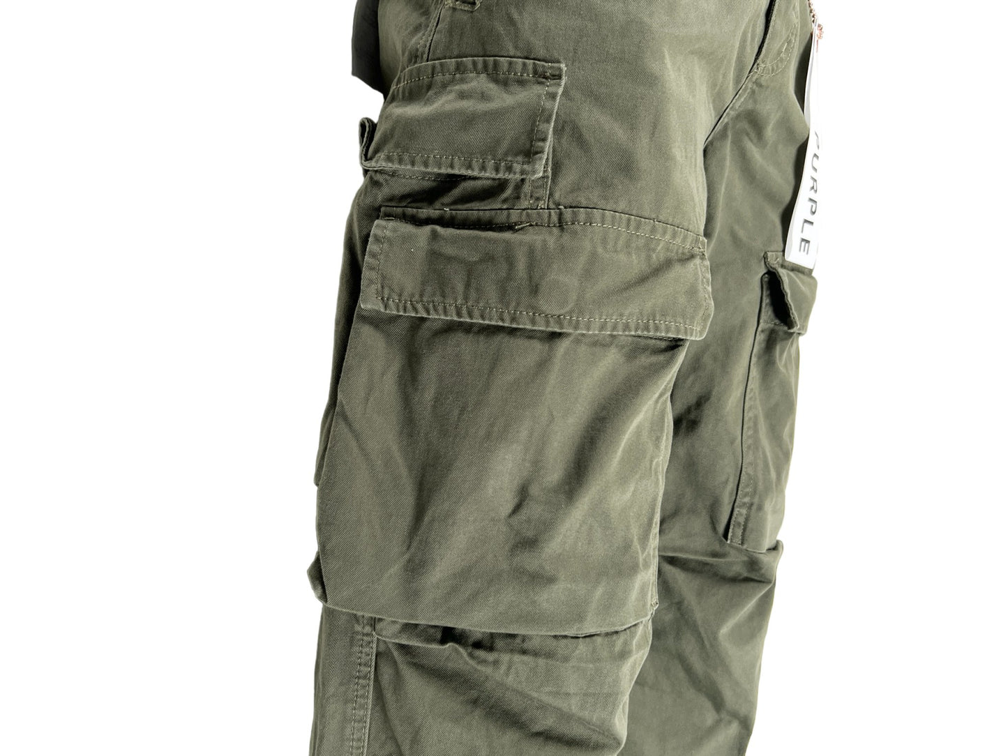 A man wearing comfortable PURPLE BRAND cargo pants in olive green with drawstring ties.