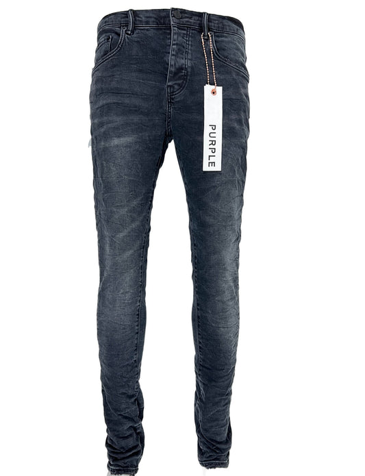 A pair of PURPLE BRAND men's cotton jeans with a tag on them.