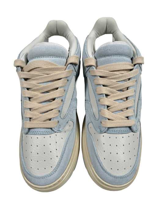 A pair of REPRESENT SNEAKERS M12043 REPTOR LOW BABY BLUE with white laces.