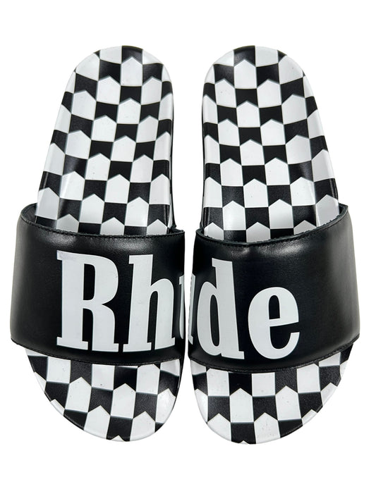A pair of RHUDE CHECKERED LEATHER SLIDES BLACK/VTG WHITE with the word RHUDE on them, featuring a rubber sole.