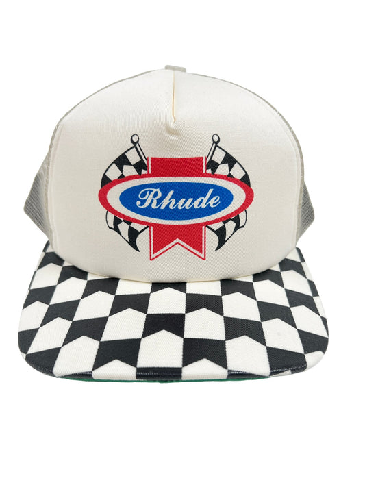 A white and black checkered trucker hat with the word RHUDE CHEVRON RALLY on it.