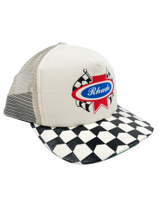 A white and black checkered RHUDE CHEVRON RALLY trucker hat.