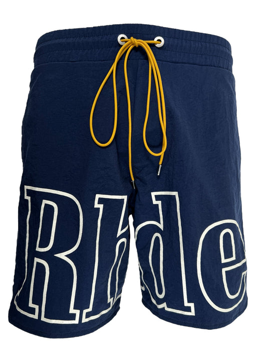 A blue RHUDE logo track-short navy with the word "ride" on it.