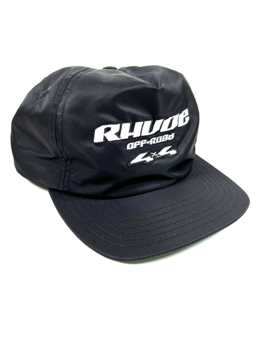 A black nylon hat with the word RHUDE embroidered on it. 
Product Name: RHUDE NYLON 4X4 HAT BLACK 
Brand Name: RHUDE