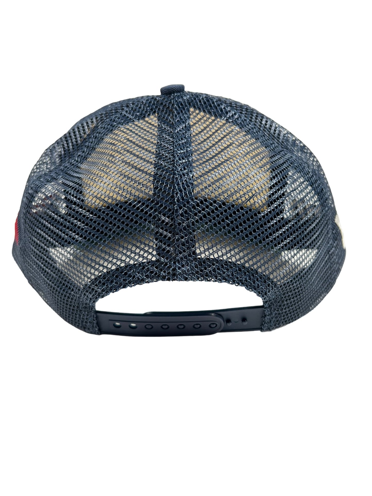 The back of a navy RHUDE SAINT CROIX mesh trucker hat.