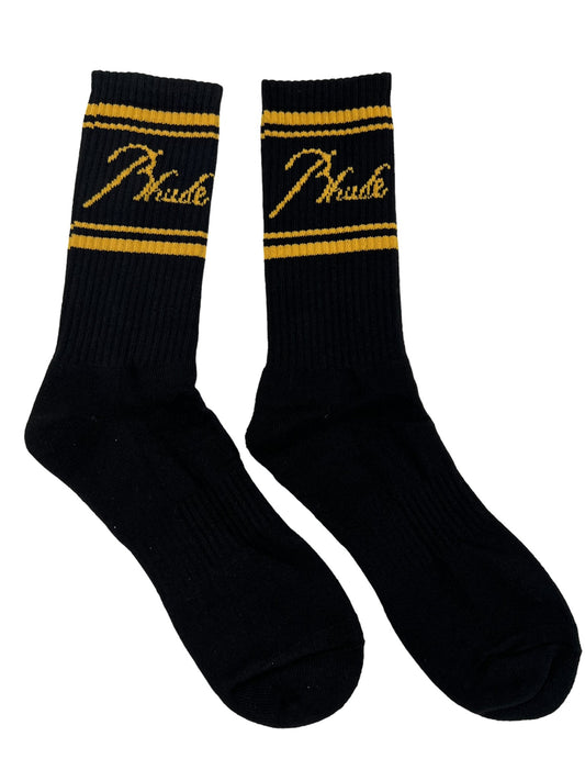 A pair of black and yellow cotton socks with the word phoenix on them: RHUDE SCRIPT LOGO SOCK BLK/YEL by RHUDE.