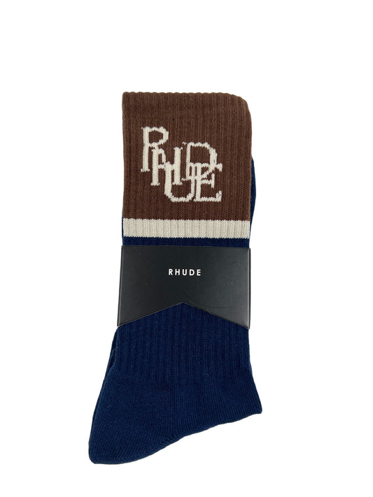 A pair of cotton-blend blue and brown RHUDE SUITING LOGO SOCK NAVY/TAN/BROWN with the word 'pure' on them.