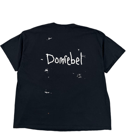 A DOM REBEL black graphic t-shirt with the word DOMREBEL VINTAGE TOON CAPSULE BLACK on it, featuring Swarovski enhancements.